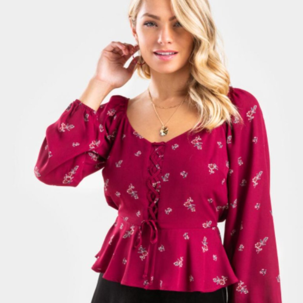Francesca's Floral Lace-Up Peplum Blouse